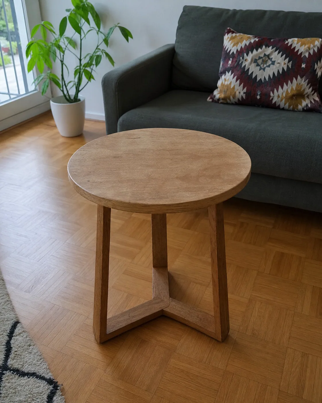 Round wooden side table – view 1