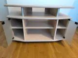 TV stand with acrylic glass and wheels – view 1